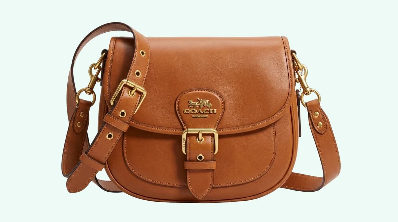 Front view of a Coach Saddle Bag 23 in black leather