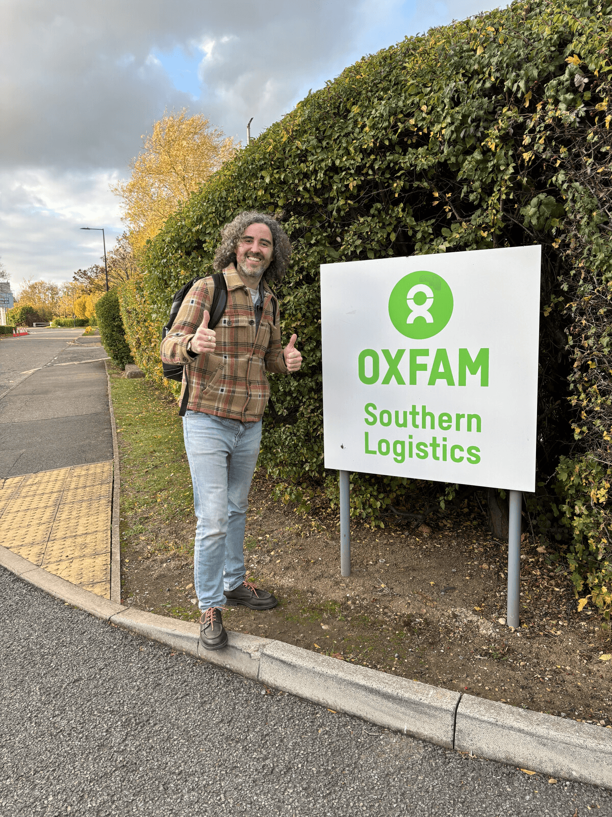 Rónán Ó Dálaigh, CEO of Thriftify, walking the warehouse floor at Oxfam Southern Logistics.
